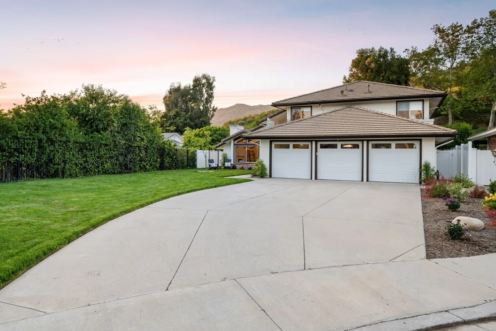 suburban home with new driveway installed