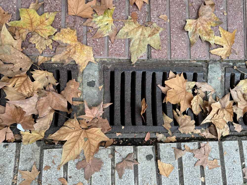 Proper drainage preventing water buildup on asphalt pavement